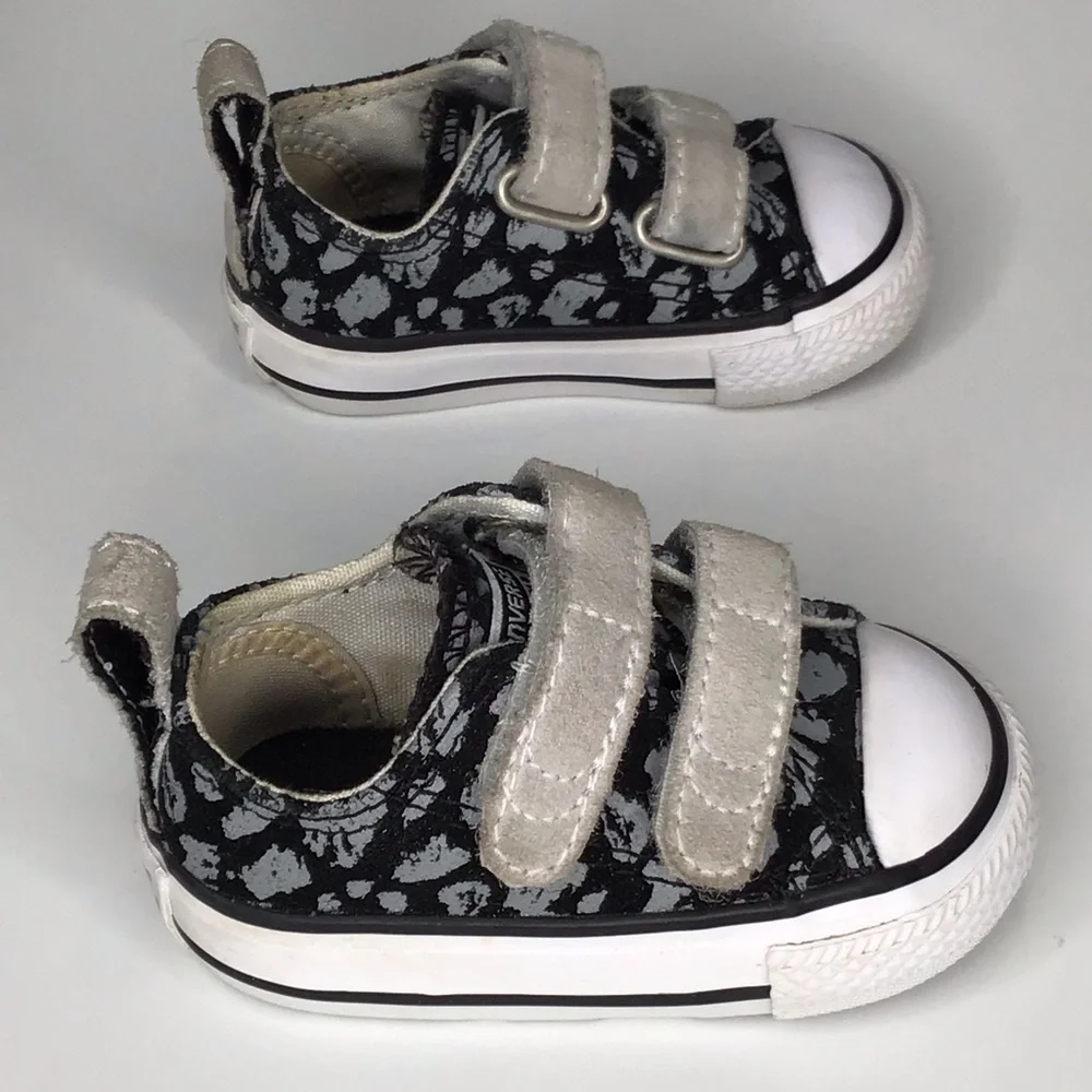 Converse Chuck Taylor All Star 2V Black and Gray Leopard Print Sneakers.